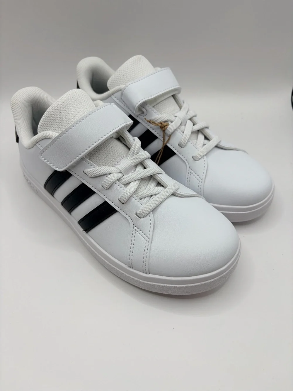 Adidas White Sneakers with Black Stripes